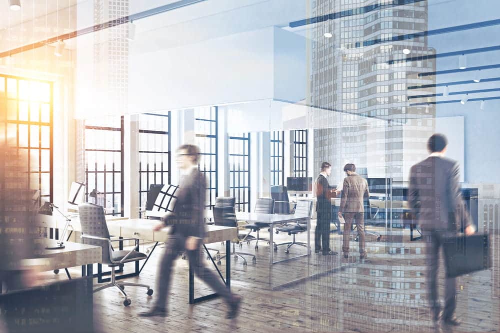 Business people walking in office